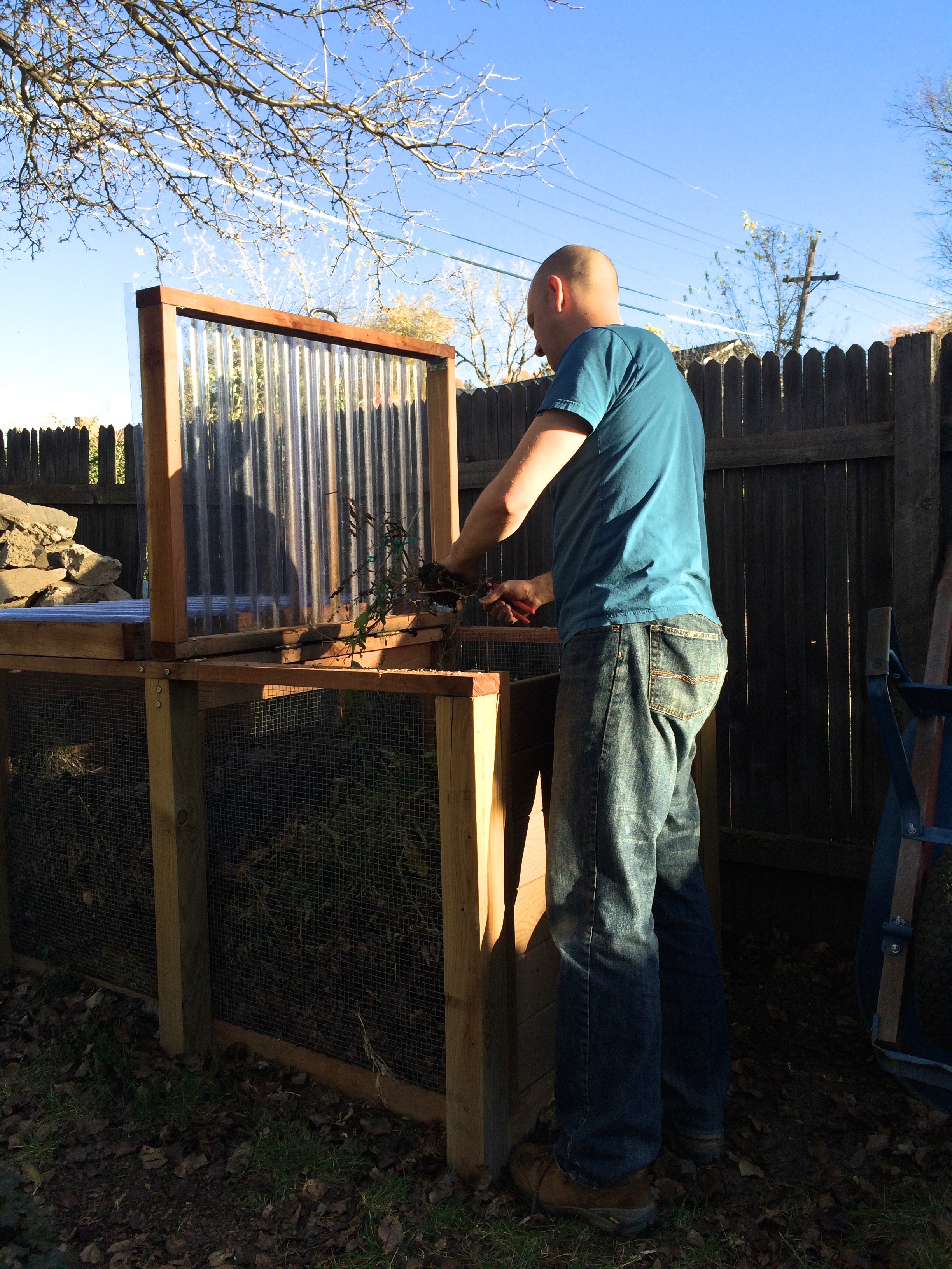 Steve composting the summer garden