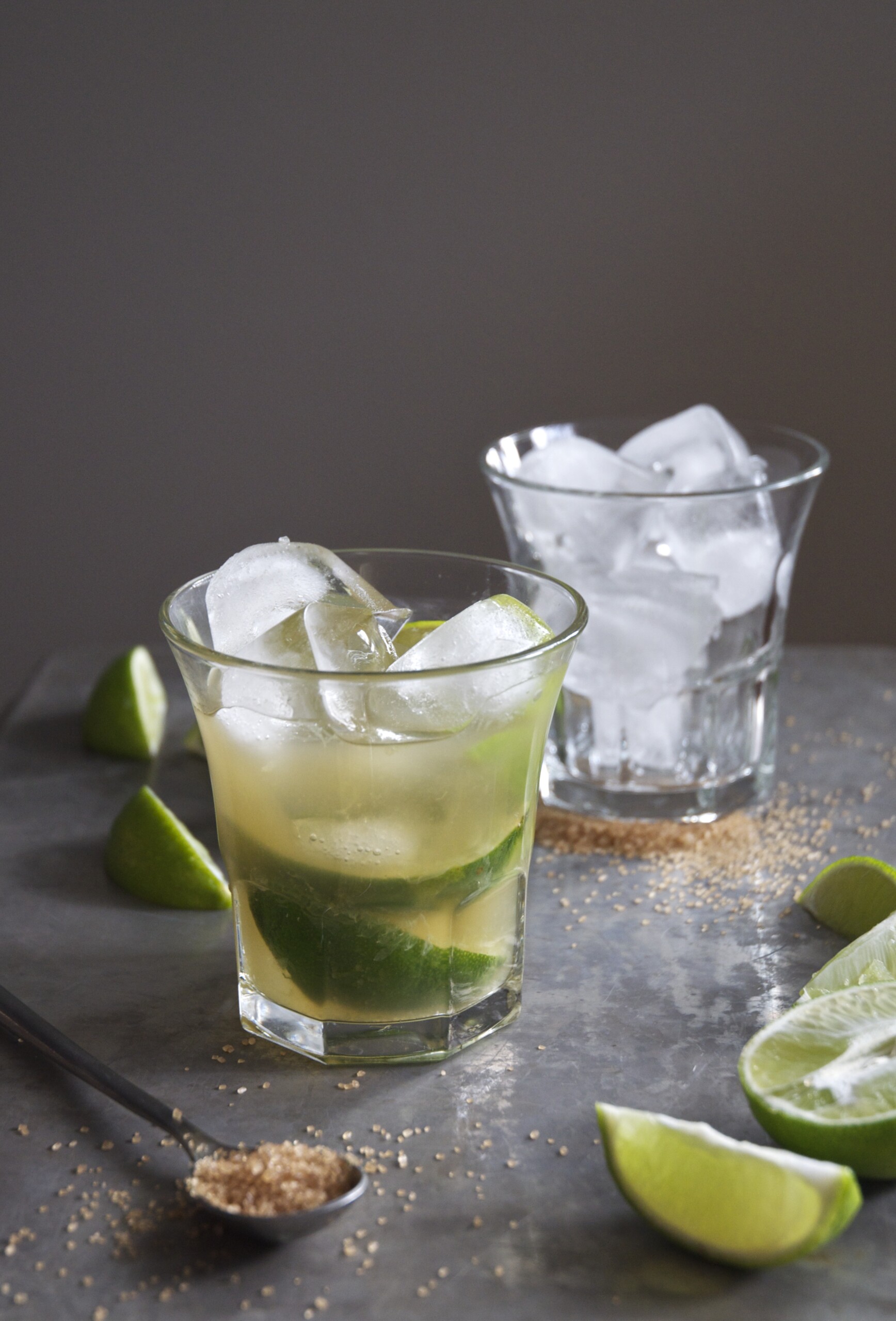 two glasses filled with caipirinha cocktail